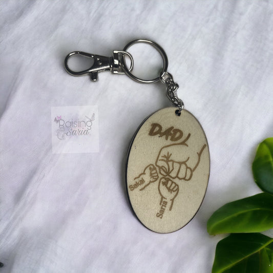 “Dad” oval keychain